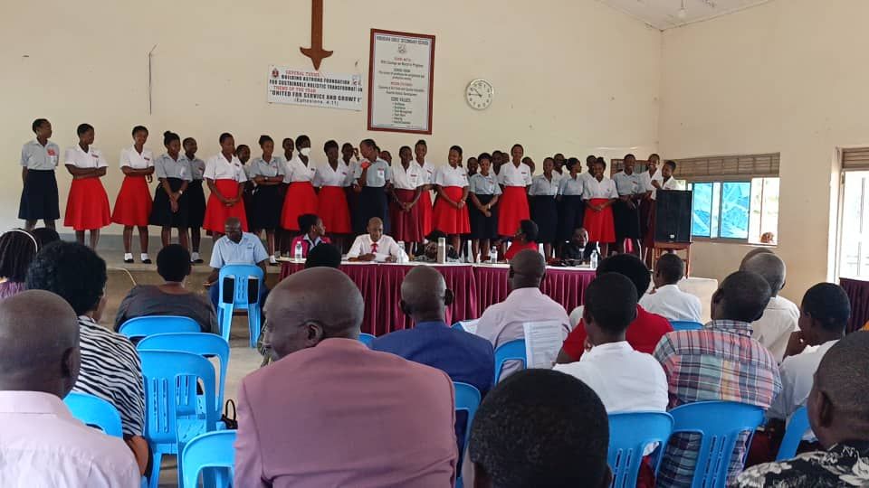 Community members gathered inside a hall during a TVIA program